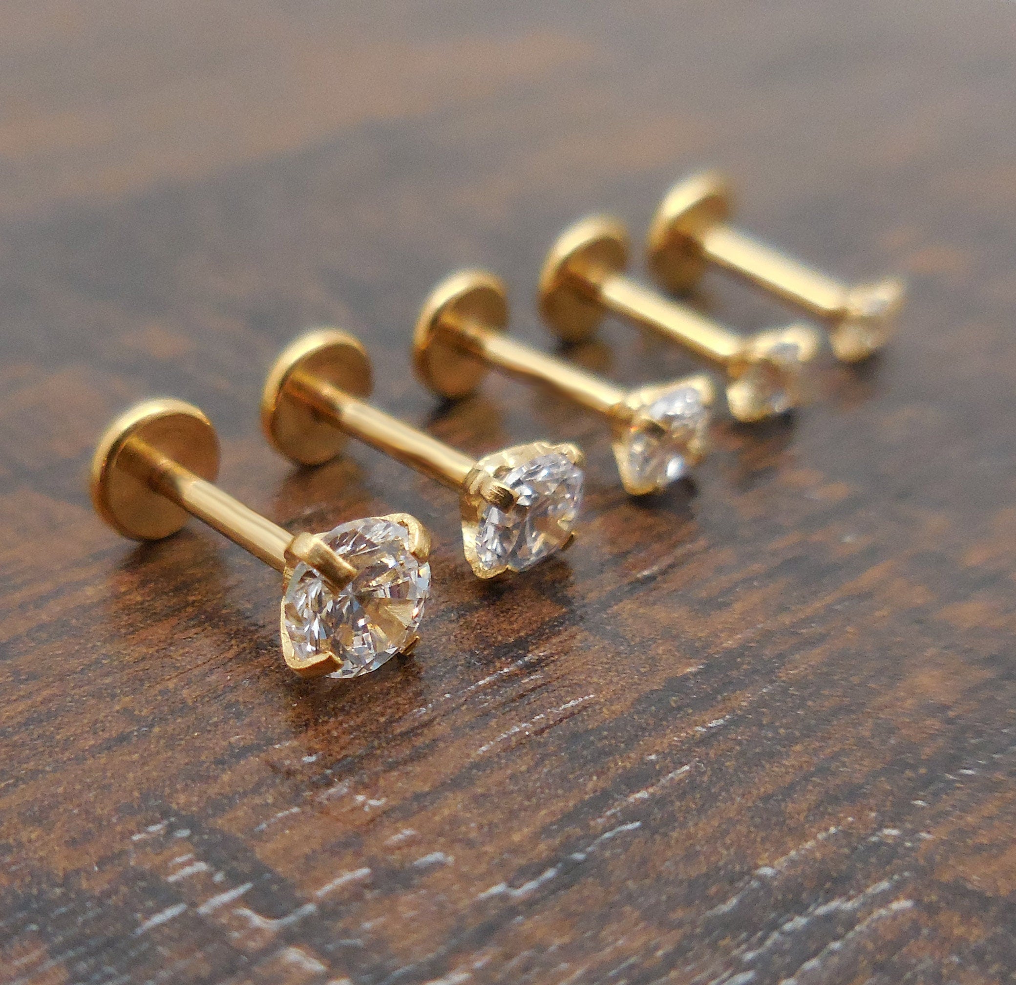 Triple Forward Helix 3-Pack Rose Goldtone CZ Barbells | BodyDazz.com